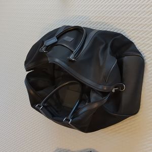 Black canvas and leather Coach weekender, travel bag